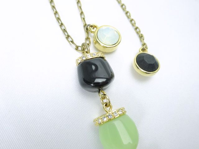 SWAROVSKI/スワロフスキー ネックレス 中古 ロングトップで印象的な胸元に♪ ゴールド×ブラック×グリーン
