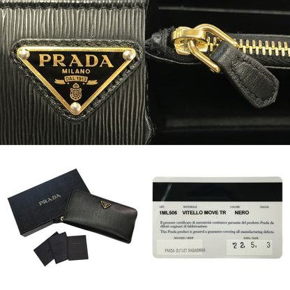 PRADA プラダ VITELLO MOVE TR ヴィッテロムーブ 長財布 メンズ ラウンドファスナー ジップ レザー 三角プレート ブラック 1ML506 中古 T1
