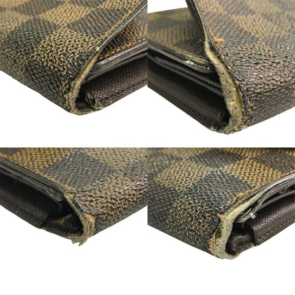 LOUIS VUITTON ルイヴィトン ダミエ ポルトトレゾールインターナショナル 長財布 ユニセックス 三つ折り 小銭入れあり ホック ブラウン N61215 中古 T1