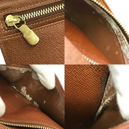 LOUIS VUITTON ルイヴィトン モノグラム コンチネンタルクラッチ 長財布 ユニセックス 二つ折り 小銭入れあり がま口 USA製 ブラウン T61217 中古 T1