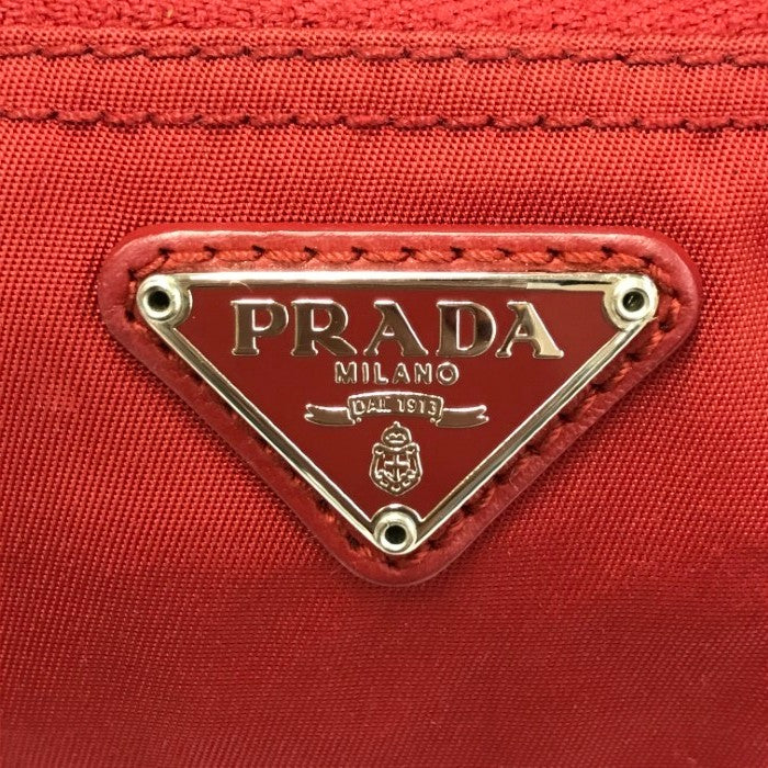 PRADA プラダ コスメポーチ レディース ナイロン 化粧 小物 ファスナー 三角プレート レッド 中古 T1