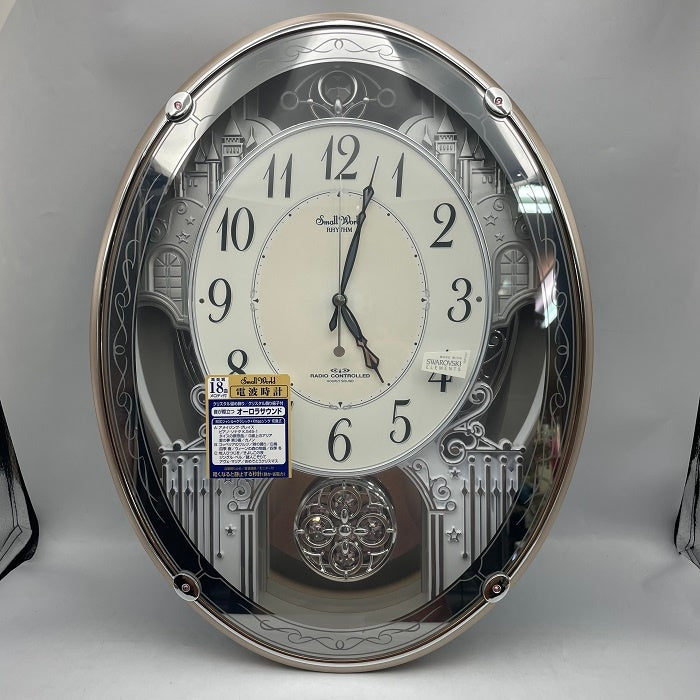 リズム時計工業 Small World  スモールワールドクォーレ 掛時計 プラスチック枠/ピンクメタリック色 4MN516RH13 メロディ付 電波時計 18曲 中古 R4