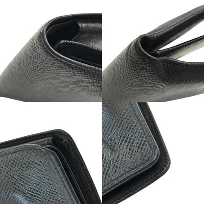 LOUIS VUITTON ルイヴィトン タイガ ポルトフォイユ フロリン 財布 メンズ 二つ折り パスケース 小銭入れ付き ブラック M31112 中古 T1