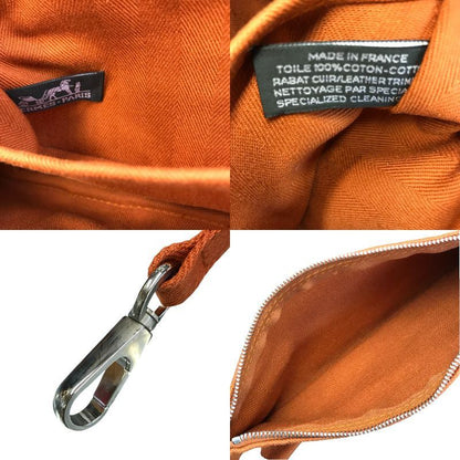 HERMES エルメス ヴァルパライソロングPM ハンドバッグ レディース キャンバス/レザー ポーチ付き ミニサイズ フラップ オレンジ 中古 T1