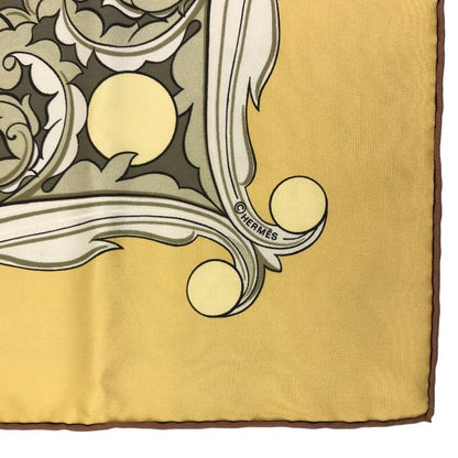 HERMES エルメス カレ90 ANIMAUX SOLAIRES 太陽の動物たち スカーフ レディース シルク 馬 ライオン 鷹 鹿 イエロー/ブルー/ブラウン 中古 T1