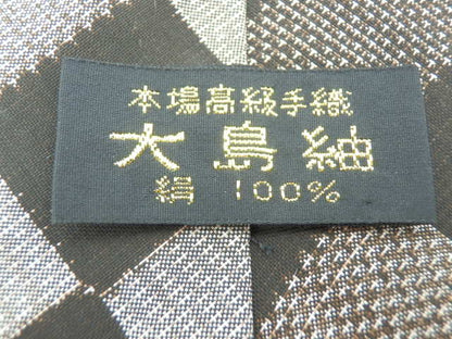 未使用品 本場奄美大島紬 絹 100％ チェッカー 柄 ネクタイ 中古  大島つむぎ シルク ブランド おしゃれ 伝統工芸 ビジネス メンズ
