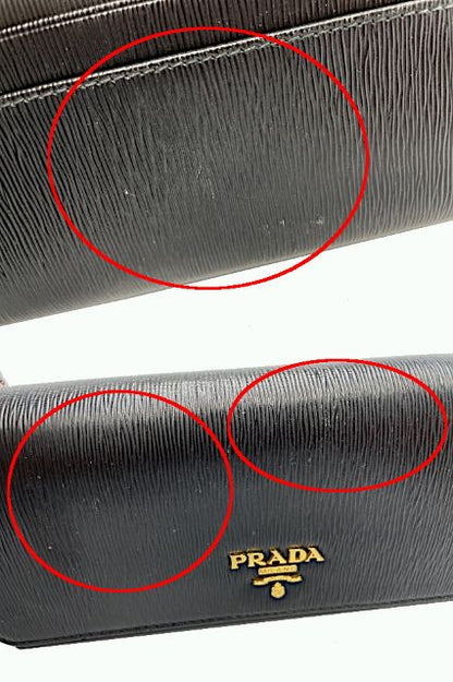 PRADA プラダ レザー 二つ折り長財布 中古  ブラック 黒 ウォレット レディースブランド